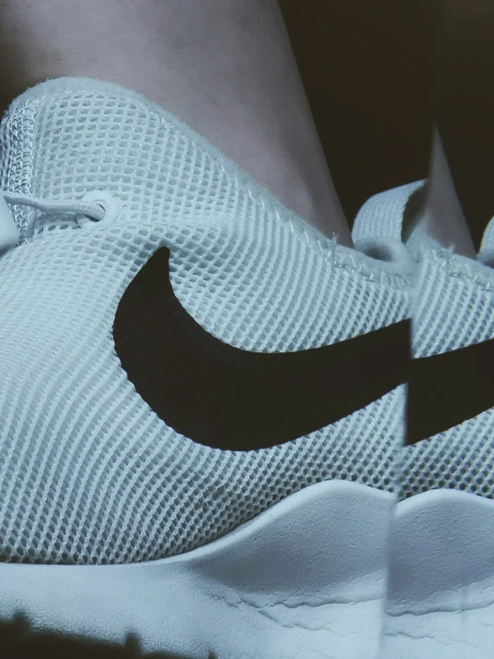 the nike tennis shoe is shown from above