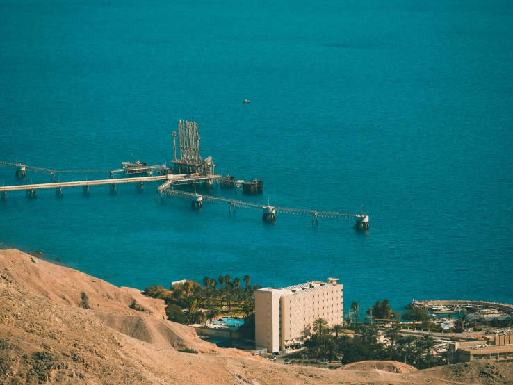 a big bridge that is in the middle of some water