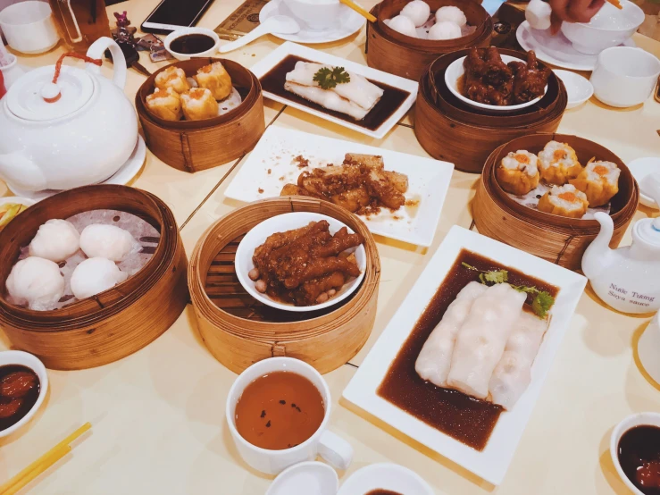 food is in baskets on a table ready for consumption