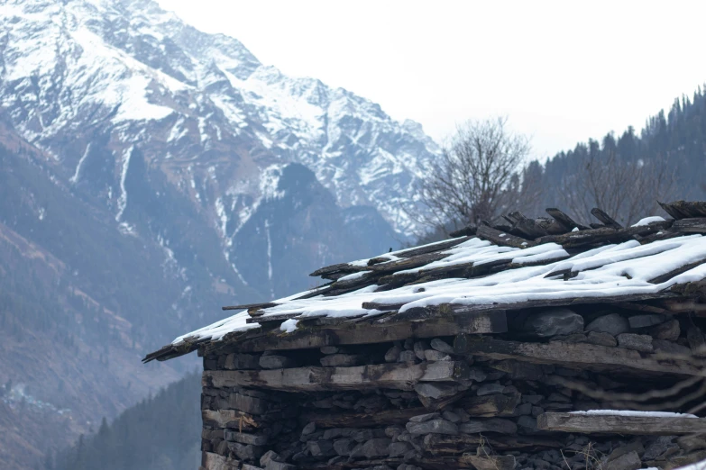 this po depicts a cabin on the top of a mountain