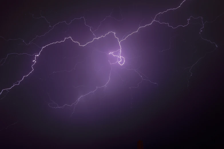 the picture shows a large, bright electrical storm in the air