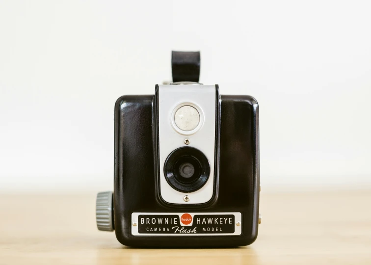 a very old camera sitting on a table