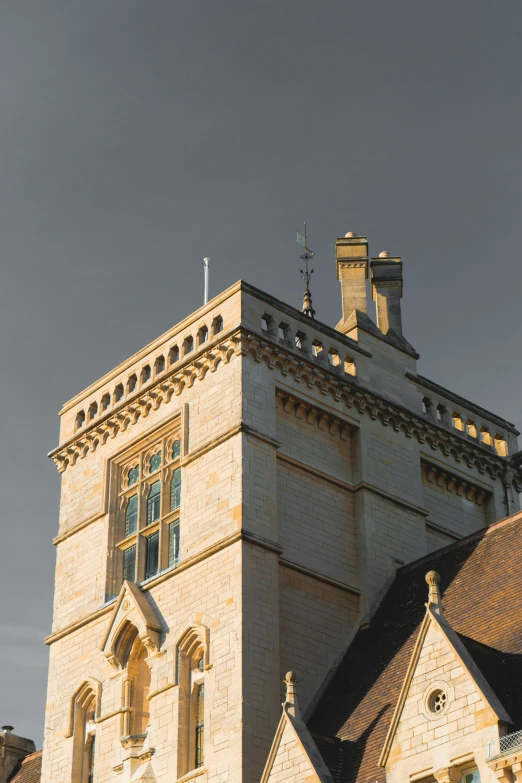 the old building has lots of windows and steeples