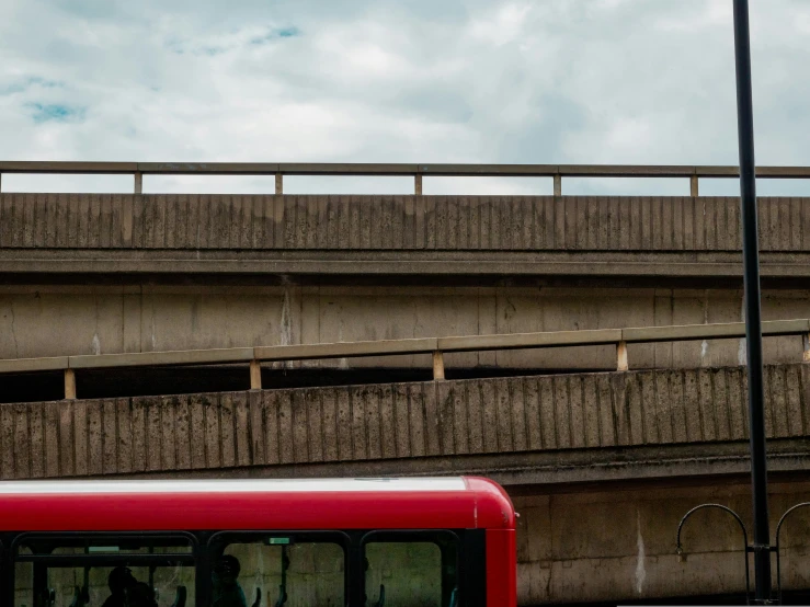 a bus that is by a road in the city