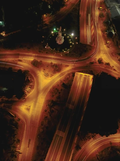 an aerial view of city streets at night