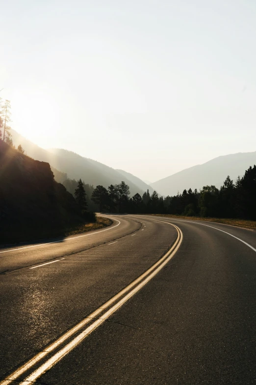 a car drives down the road at high speeds