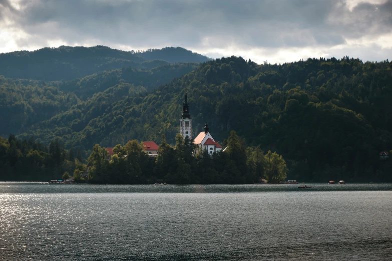 a church is in the middle of a body of water