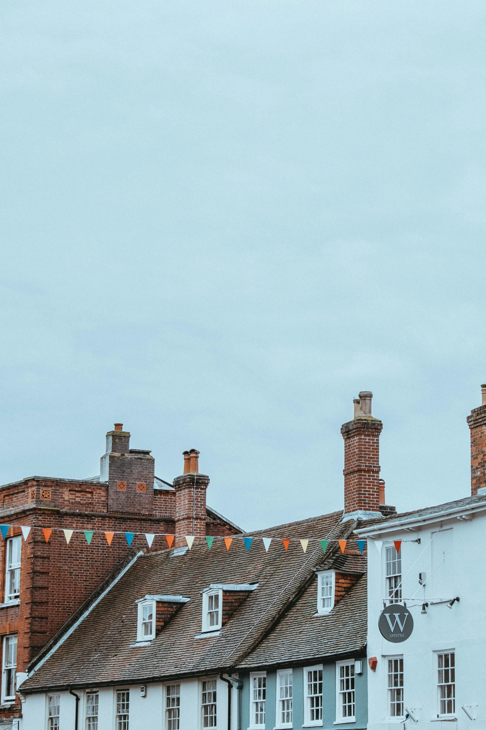 a view of the roofs and chimneys of houses in england