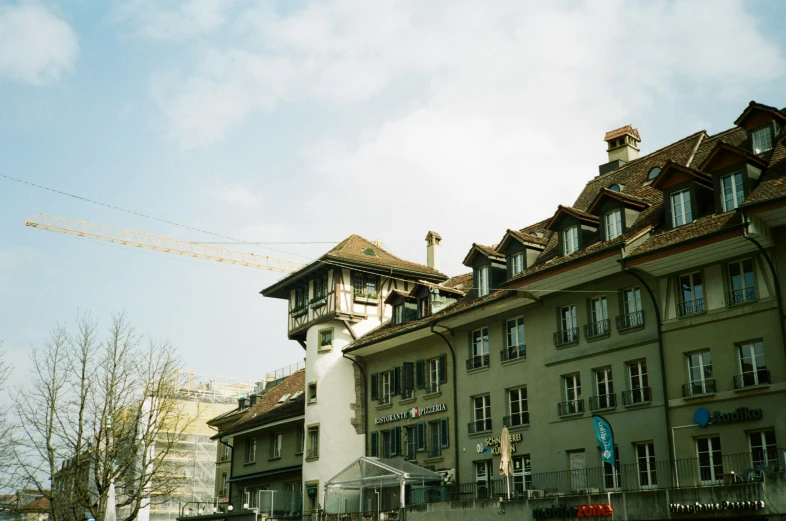 a clock tower sitting in front of a building