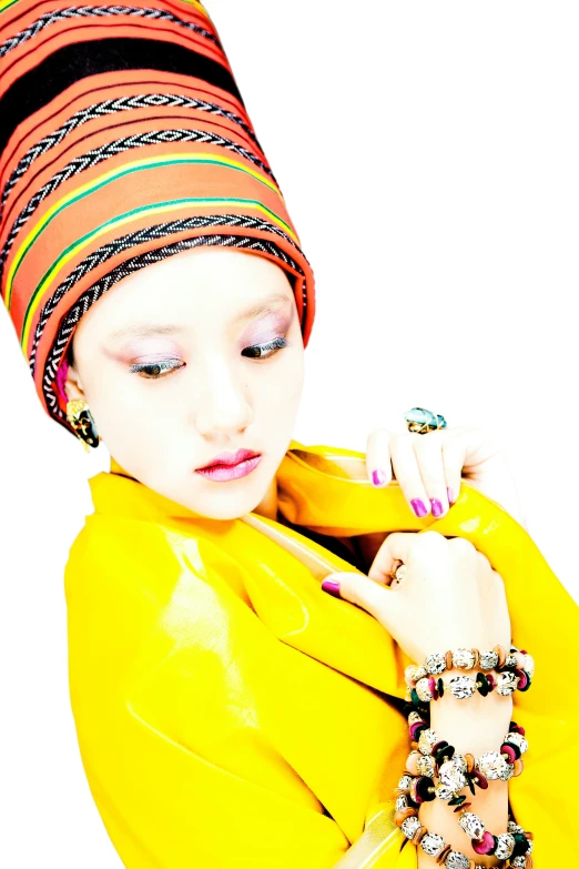 a close up of a woman wearing a beanie and colorful clothes