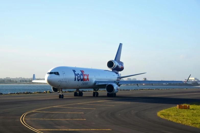 large commercial airplane taking off from an airport runway