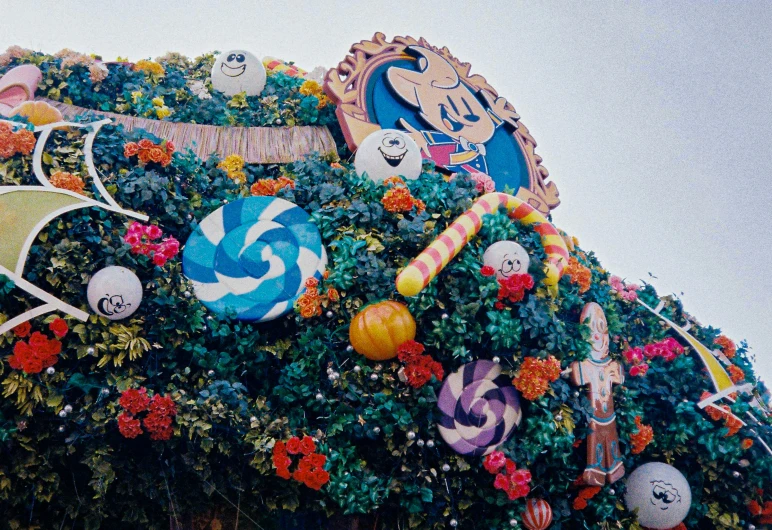 some colorful decorations are placed on the top of a building