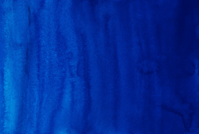 an abstract background that is painted in blue tones