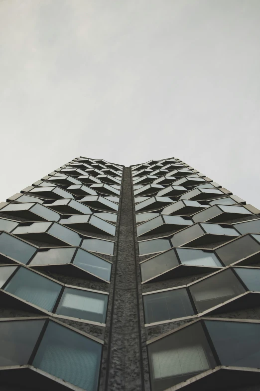 the top of a tall building is seen up