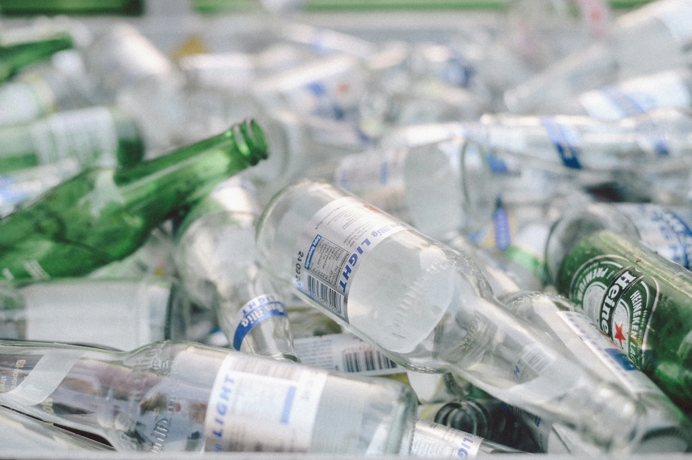 bottles in a pile full of the same color bottles