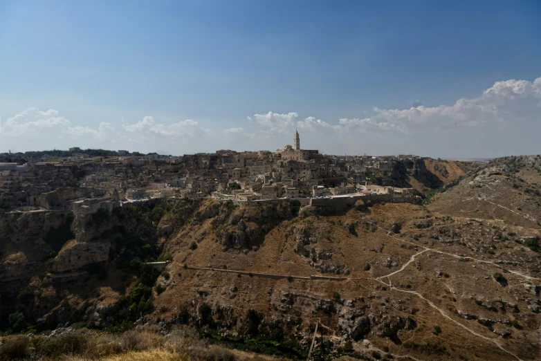 there is a hill with a tower on top