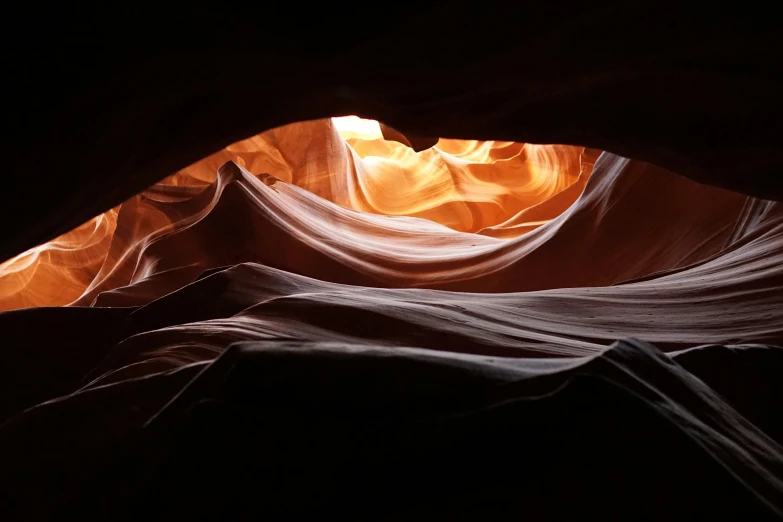 a large window with lots of material hanging in it