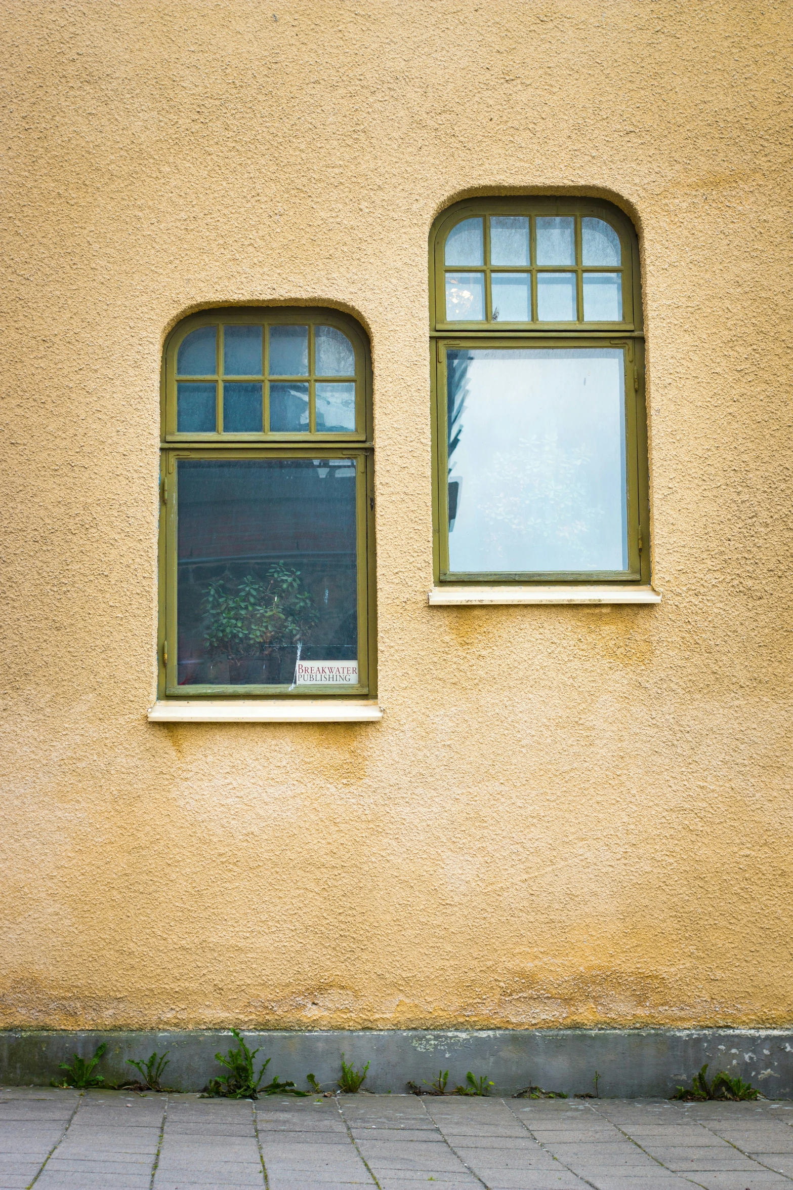 a couple of windows sit next to each other