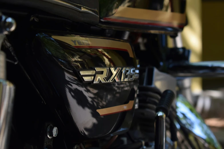 the front view of a parked motorcycle next to a building