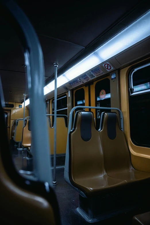 the seats are empty as the subway train is parked