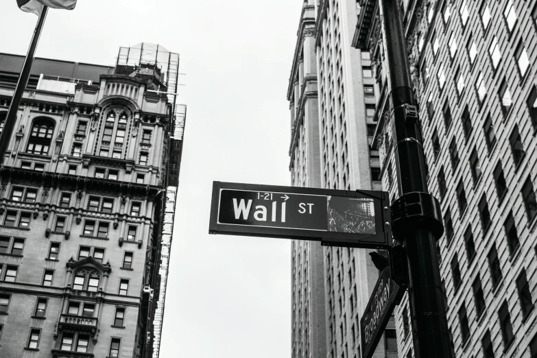 black and white pograph of street signs in an urban setting