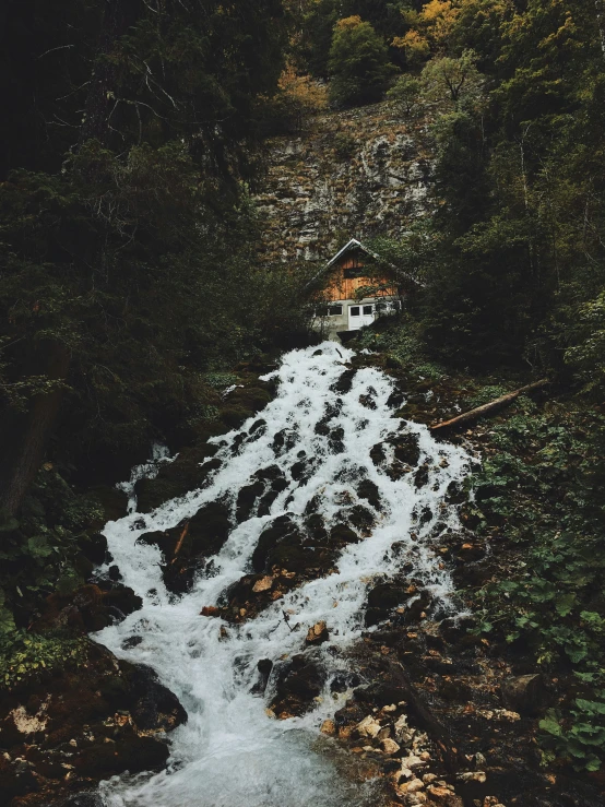 a boat is coming out of a river