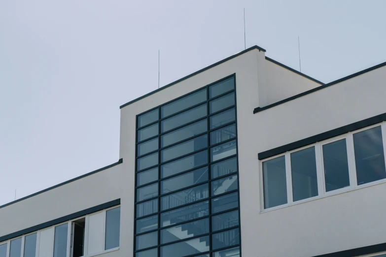 the front of a building with a lot of windows