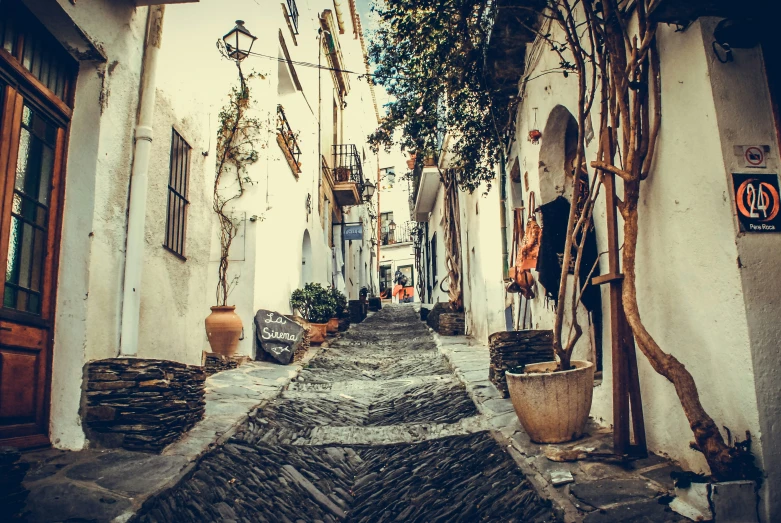 an alley in an old town that has been turned into an urban area