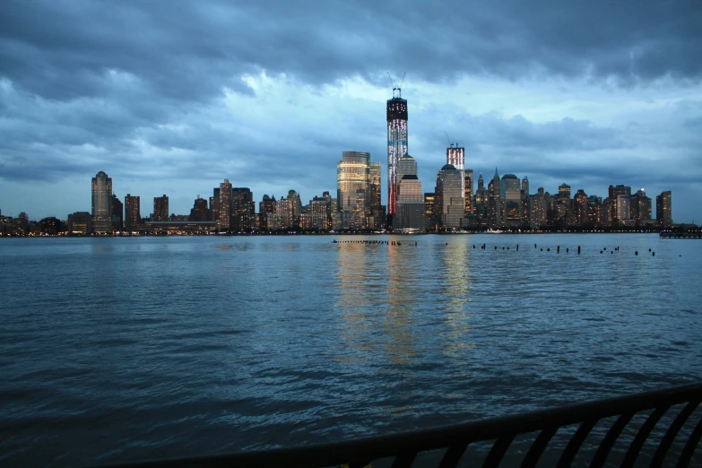 the city is seen from across a river