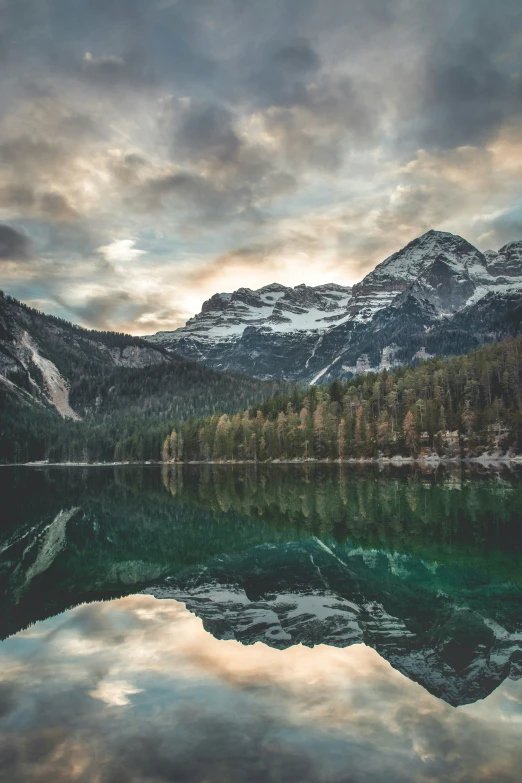 some water and mountains that are next to each other