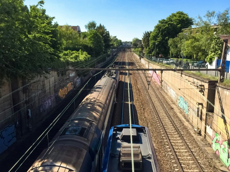 a view looking down on two trains passing each other