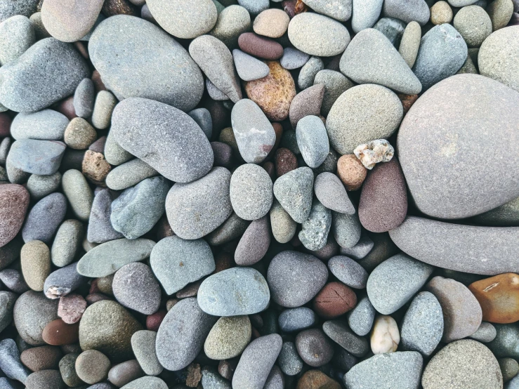 stones and pebbles are arranged in a variety