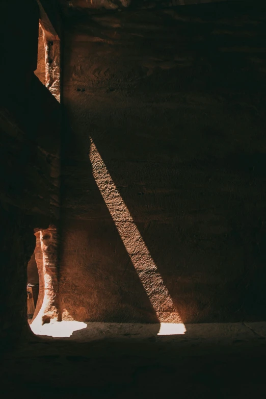 some light shines on a tall concrete structure