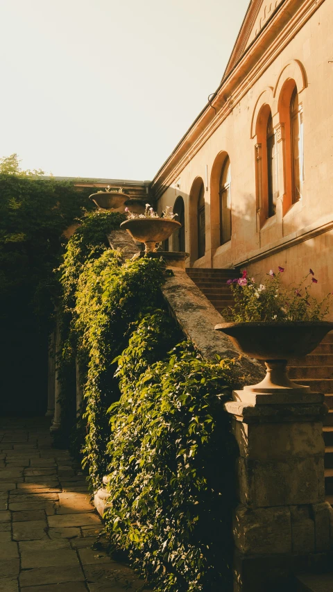 stone steps lead down to an old building