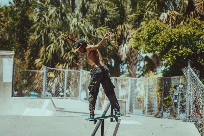 a skateboarder jumping off a skate board ramp