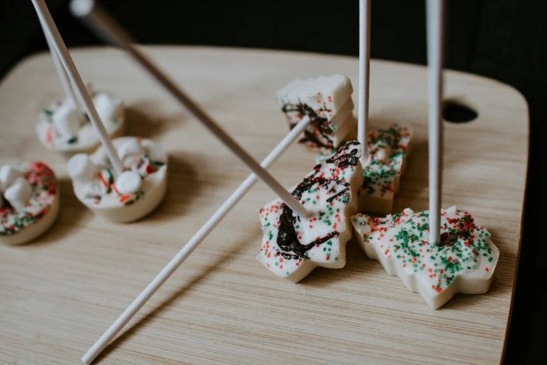 several mini cake pops are on top of a table