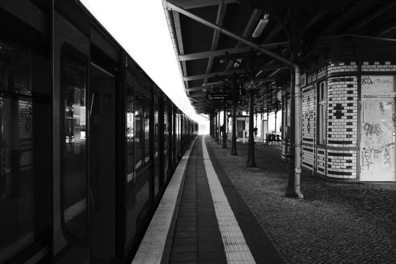 a train parked at a station with many empty areas