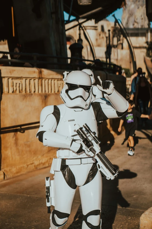 a storm trooper with a machine gun in hand