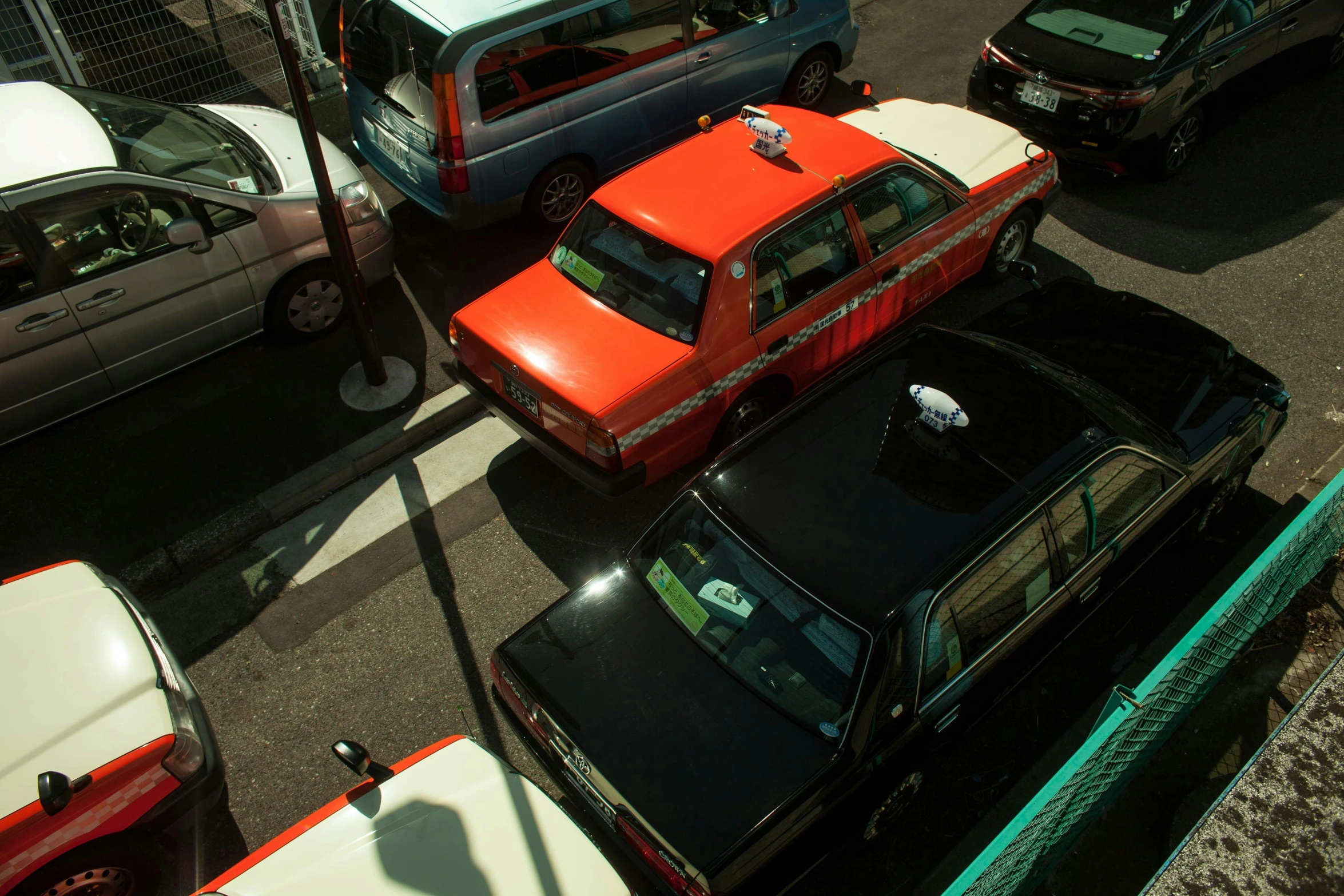 a view of an aerial view of some cars on a street