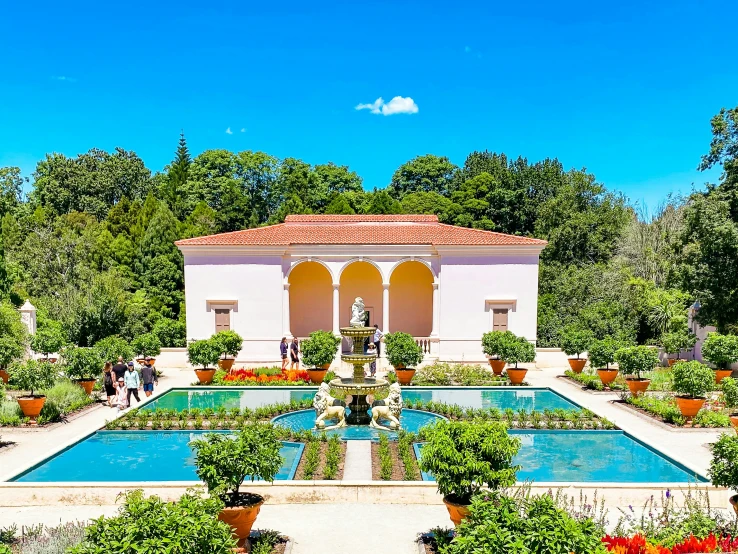 a view from above of a garden area with a fountain