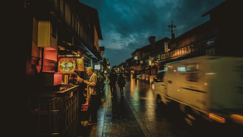 the city street is crowded with people walking