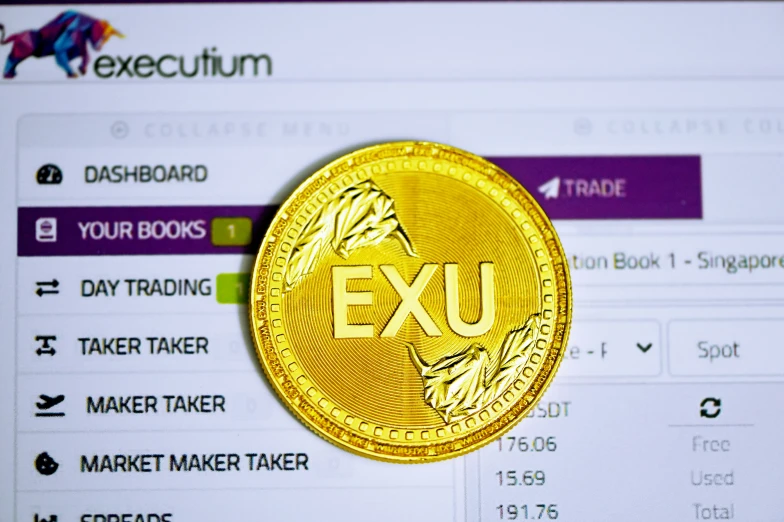 a gold exu token on an e - book page