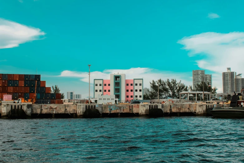 a body of water with a city and two boats