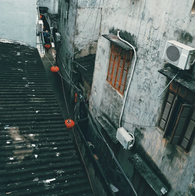 a view of the side of a building from up on a stair