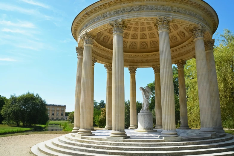 the building has columns and arches all around it