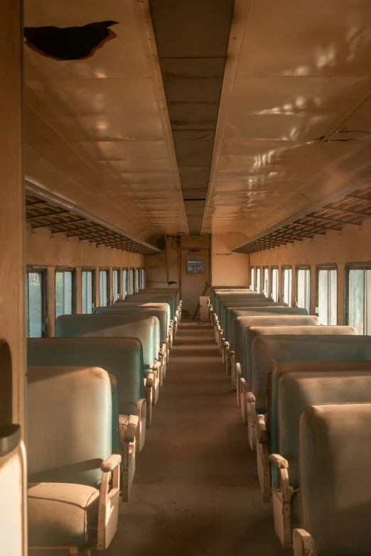 the inside of a train that has seats and windows