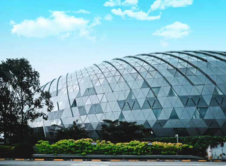 large structure at the edge of a busy urban park