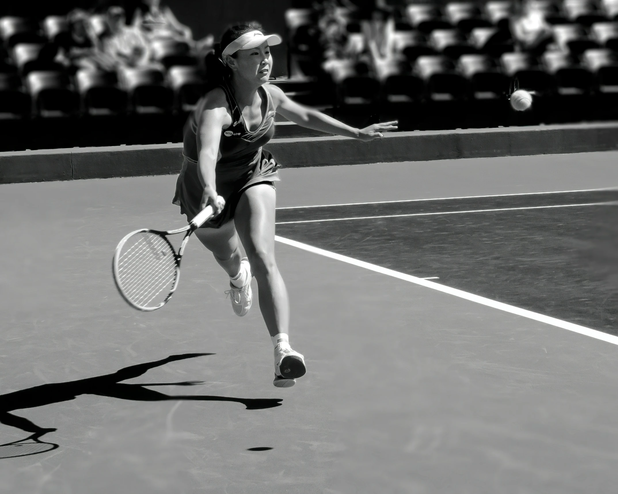 a woman is running to hit a tennis ball