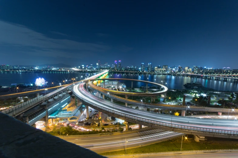 a highway is lit up with various lights