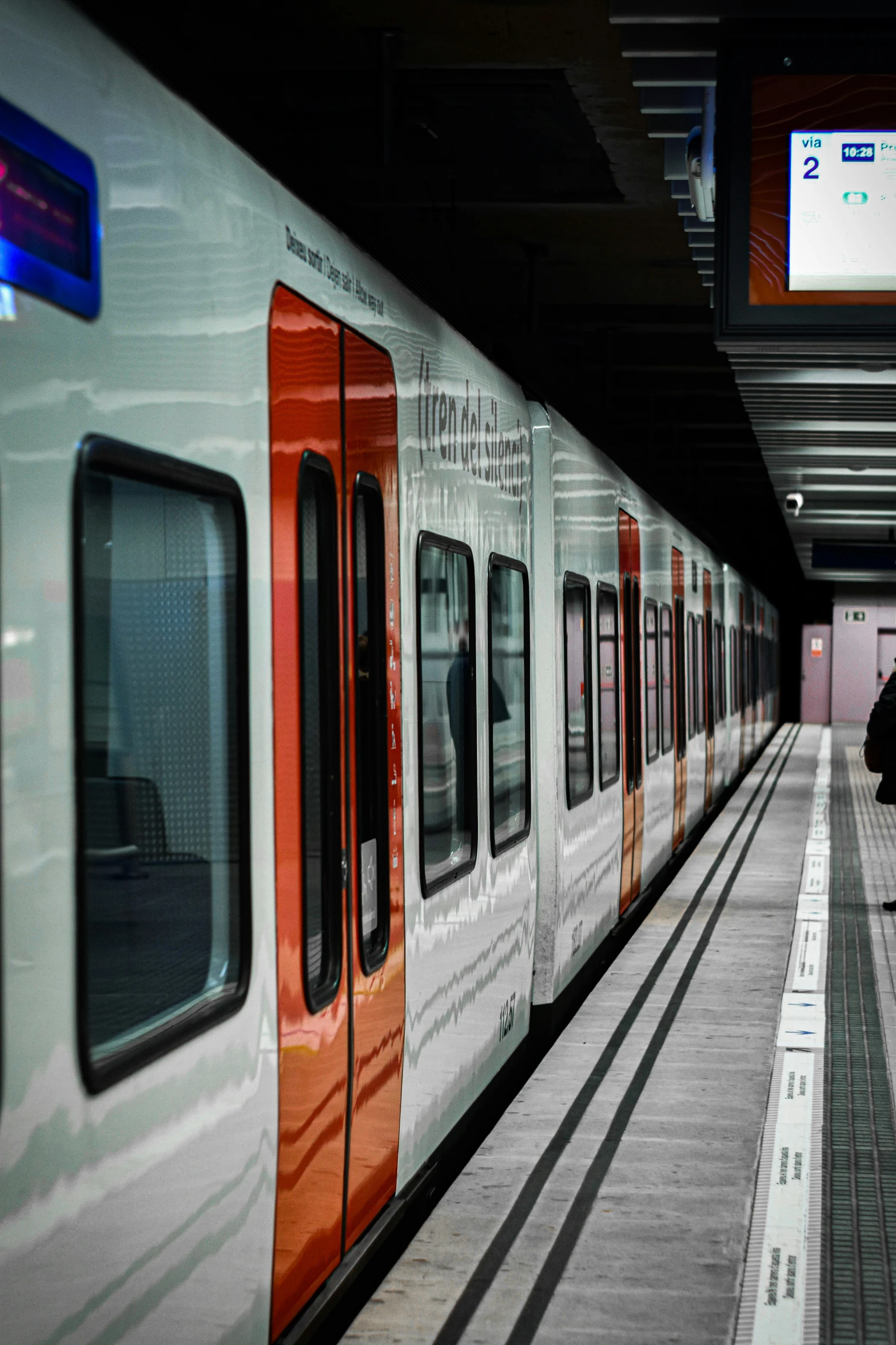 a person waits for the train to arrive